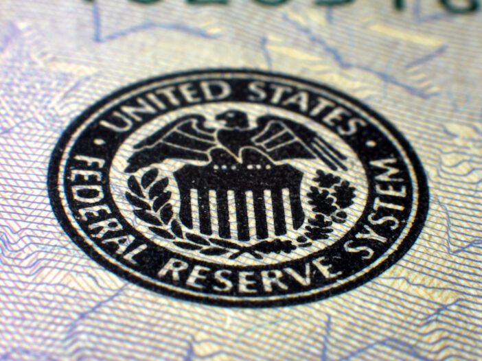 US Federal Reserve logo on note